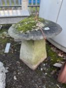 A WEATHERED CONCRETE STADDLE STONE, on a square tapered base, diameter 50cm x height 53cm, condition