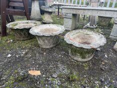 A SET OF THREE WEATHERED CONCRETE OVAL PLANTERS, with lattice decoration, width 51cm x depth 41cn