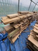 A COLLECTION OF LIVE EDGE OAK PLANKS of varying widths, thicknesses and lengths the largest being