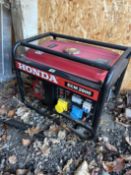 A HONDA ECM 2800 PETROL GENERATOR, with a 115v and 230v, condition report: engine turned but not