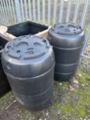 A PAIR OF WATER BUTTS, height 57cm x height 98cm (2)