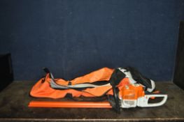 A STIHL HS45 PETROL HEDGE TRIMMER with Stihl bag and blade guard, condition report: engine pulls