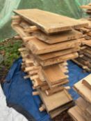 TWENTY NINE LENGTHS OF SEASONED OAK PLANKS some sawn on all edges but most with at least one live