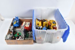 A QUANTITY OF UNBOXED BUILT LEGO SETS, to include what looks to be a castle, reference 6080, another