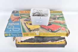 A BOXED EARLY SCALEXTRIC RACING SET, to include tinplate Maserati 250F F1 car, green body, red nose,
