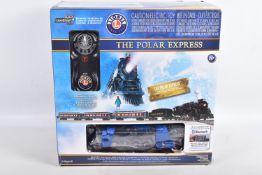 A BOXED LIONEL O GAUGE THE POLAR EXPRESS TRAIN SET, No.6-84328, appears complete and in very good
