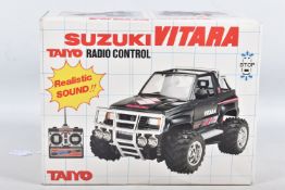 A BOXED TAIYO PLASTIC REMOTE CONTROL SUZUKI VITARA 4 X 4, No.9028, not tested, appears complete