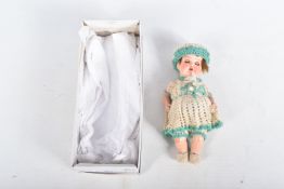 A HEUBACH KOPPELSDORF BISQUE HEAD DOLL, nape of neck marked 'Heubach Koppelsdorf 320.14/0 Germany'