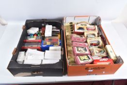 AN ASSORTMENT OF BOXED AND LOOSE DIECAST MODEL VEHICLES, to include models by Lledo, Corgi.