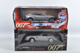 TWO BOXED 1:18 SCALE 007 JAMES BOND MODEL VEHICLES, the first a Autoart Goldfinger Aston Martin