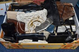 A BOX OF VINTAGE HANDBAGS comprising approximately twenty two assorted bags in various styles to