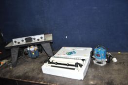A RYOBI ROUTER TABLE fitted with a Ryobi ERT-1150V router (PAT pass and working), a Ryobi 1 HP