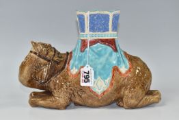 A NINETEENTH CENTURY ROYAL WORCESTER CAMEL VASE, designed by James Hadley, the recumbent camel