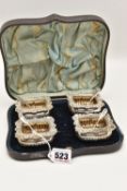 A CASED LATE VICTORIAN SILVER CRUET SET, comprising of four rectangular embossed salts with floral