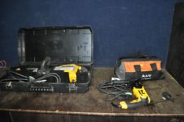 A DeWALT D25900 240V SDS BREAKER in case and a DeWalt DC25013 240V SDS drill with spare chuck and an