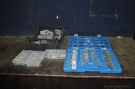 A COLLECTION OF TAPS AND DIES including a 110 piece metric set and a small tray of burrs