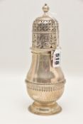 A GEORGE V SILVER SUGAR CASTER, decorated with a stop reeded design, floral pierced pattern to the