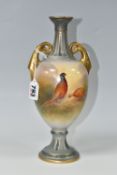A SAMUEL FIELDING & CO CROWN DEVON VASE, of pedestal form with twin gilt handles, hand painted