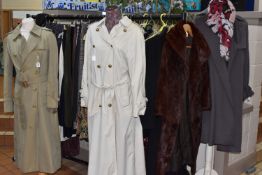 A LARGE QUANTITY OF VINTAGE LADIES CLOTHES, to include two Burberrys rain coat, one in a khaki green