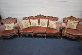 A REPRODUCTION FRENCH THREE PIECE LOUNGE SUITE, with a scrolled and foliate frame, buttoned