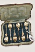 A CASED SET OF SIX EARLY 20TH CENTURY SILVER APOSTLE TOP TEASPOONS, each with a twisted stem,