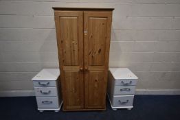 A MODERN PINE DOUBLE DOOR WARDROBE, width 85cm x depth 50cm x height 180cm, along with a pair of