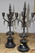 A PAIR OF 'BULLRUSH' CANDLESTICKS, possibly originally part of a clock garniture, with five candle