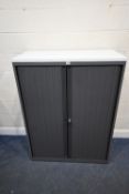 A METAL OFFICE CABINET, with double tambour doors, width 101cm x depth 48cm x height 133cm,