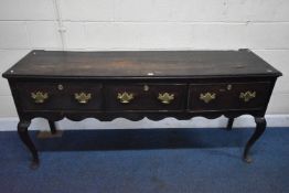 A GEORGIAN OAK DRESSER BASE, with three deep drawers, on cabriole front legs, length 87cm x depth