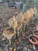 A SET OF FIVE HEAVY CAST IRON GARDEN CHAIRS, Condition report: all heavily rusted, one chair with