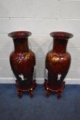 A PAIR OF LARGE SANG-DE-BOEUF ORIENTAL BALUSTER VASES, with hand painted mountain and building