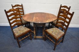 AN EARLY 20TH CENTURY OAK GATE LEG TABLE, raised on block and turned legs, open width 120cm x
