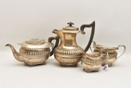 AN EDWARD VII SILVER FOUR PIECE SILVER TEA SET, comprising of a teapot, coffee pot, twin handle