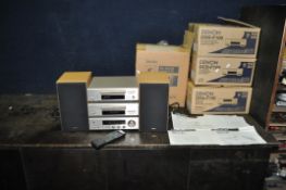 A DENON F100 MINI COMPONENT HI FI including amp receiver, CD , tape player (drawer intermittent) and