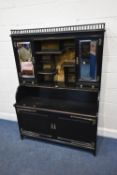 IN THE MANNER OF COLLINSON AND LOCK, AN AESTHETIC MOVEMENT EBONISED CABINET, with a raised