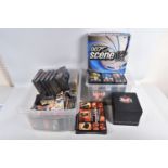 A COLLECTION OF GAMES, DVDS AND VHS TAPES, to include a ScreenLife 007 Edition Scene It? DVD game,