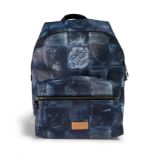 Louis Vuitton.  Discovery Backpack PM, of classic navy washed damier design, with leather cushio...