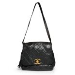 Chanel by Karl Lagerfeld.  A vintage and rare golden globe crossbody bag, of smooth quilted lamb...
