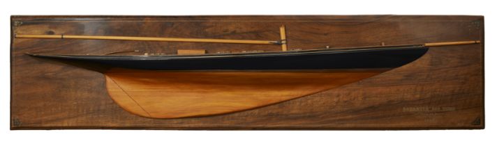 A specimen wood half-block model of the J-Class racing yacht Satanita, designed by Joseph M. Sope...