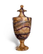 A large Derbyshire blue-john urn, late 18th century, the tapering body above a possibly later spr...