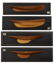 Four specimen wood half-block models of yachts, by D.C. Morley, late 20th century, each mounted o...