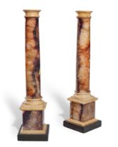 A pair of George III blue-john and white marble columns, late 18th century, the plain cylindrical...