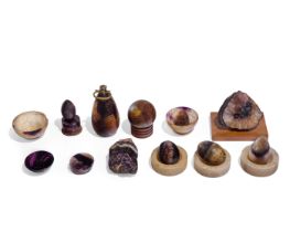 A group of Derbyshire blue-john ornaments, 19th century, comprising: five polished eggs, of vario...