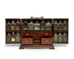 A George III mahogany apothecary chest, early 19th century, surmounted with brass carrying handle...