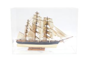 A scale model of a ship, late 20th century, in a perspex case, 63.5cm high, 89.3cm wide, 36.8cm d...