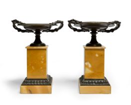 A pair of Napoleon III gilt and patinated bronze tazza, third quarter 19th century, each square-s...