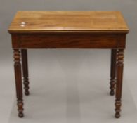 A 19th century mahogany card table and a mahogany drop-leaf table. The former 82 cm wide.