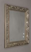 A modern wall mirror. 64 x 79.5 cm.
