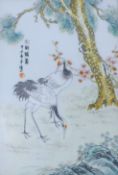 A Chinese hand-painted rectangular porcelain plaque depicting a pair or red-crowned Asian cranes in