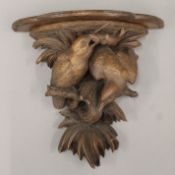 A carved Black Forest wooden wall bracket decorated with kingfishers. 28 cm high x 28.5 wide.